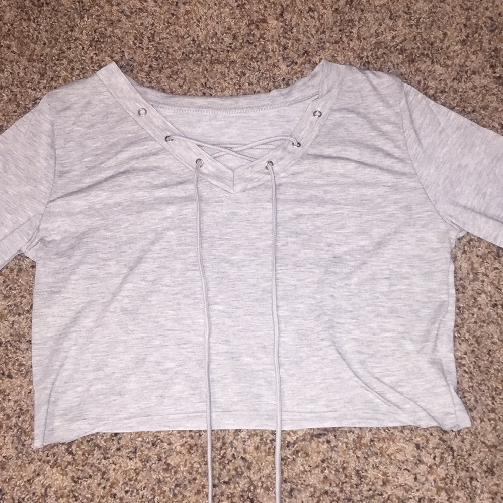 Gray cropped top.